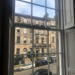 COMMERCIAL SASH WINDOW FROM THE INSIDE LOOKING OUT TO A CENTRAL LONDON STREET