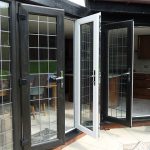 BLLACK A RATED FRENCH UPVC DOORS WITH GEORGIAN BAR OPEN OUTWARDS